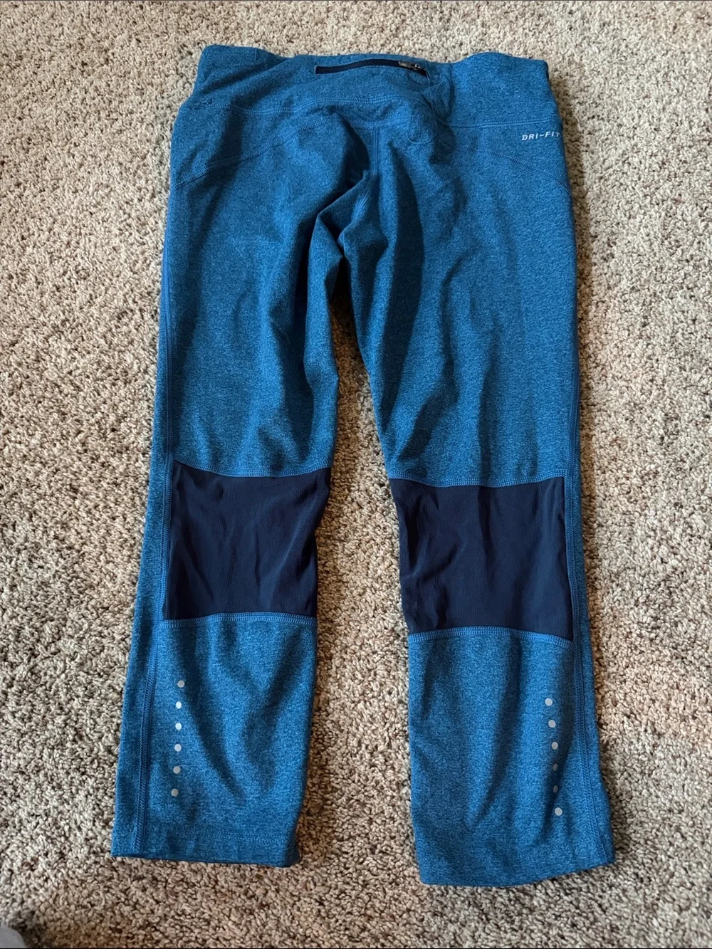 Nike Teal women’s cropped leggings